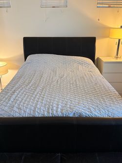 Queen sleigh bed with mattress and matching storage ottoman
