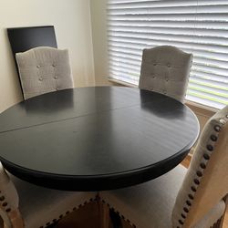  Dark wood pedestal table 