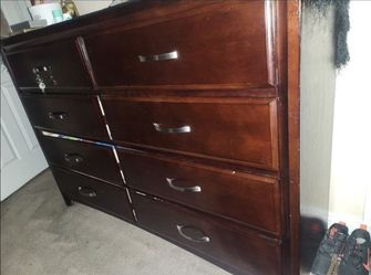 Dark Cherry Wood Dresser with Multiple Drawers