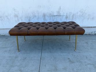 Mid century tufted leather bench.
