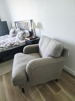 Comfy green grey upholstered armchair with turned wood legs, Los Feliz, LA
