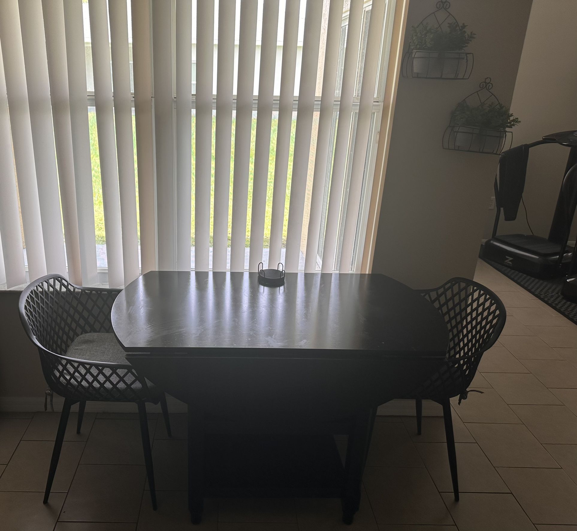 Black Extendable Round Solid Wood Base Dining Table