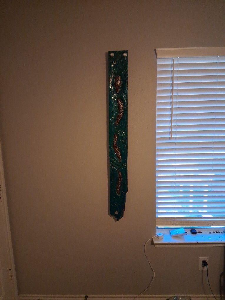 Wood Carving Of Snake In Water