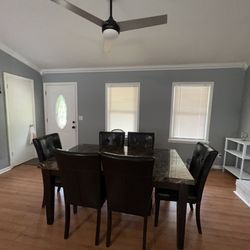 Brown Faux Marble Top dining table