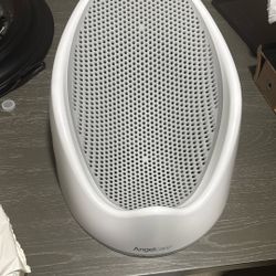  Baby Bath With An Open Diaper Pack Of Huggies 2