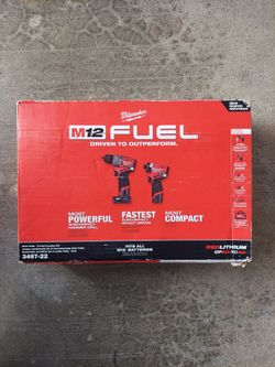 New Milwaukee FUEL 1/2" Hammer Drill 1/4" Impact Driver M12 Kit.