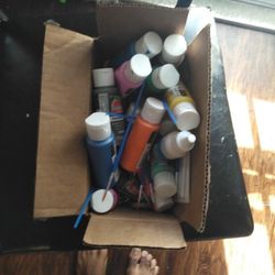 Paint Brushes And Used Paint