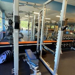 Hammer Strength Squat Rack, Hammer Strength Bench, Iron Grip Weights. 