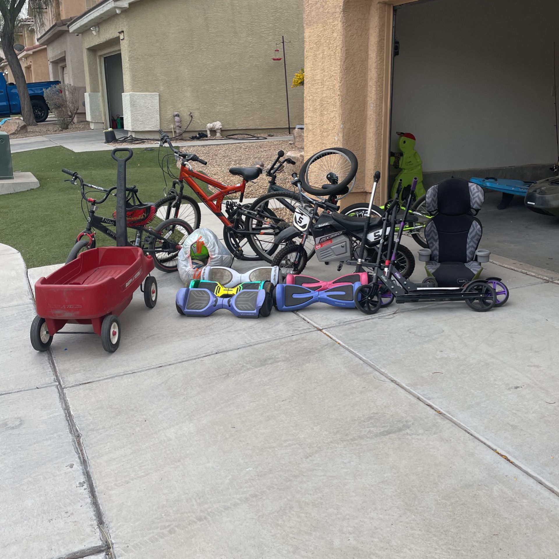 Lot Of Bicycles, Scooters, Hover Boards, Wagon, Bag Of Balls And Car Seat
