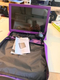 Trexonic 14” Portable LED TV with Carrying Case – $20