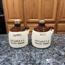Vintage Ceramic Opryland U.S.A Souvenir Whiskey Jug Pair of Salt and Pepper Shakers.  Nashville, Tennessee .  Size approximately 3 inches tall.  New