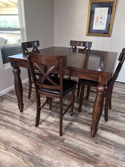 Brown wood hightop table set