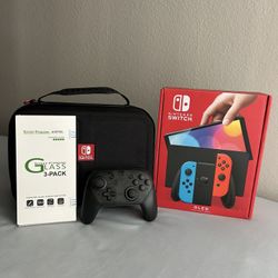 Nintendo Switch Oled + 128 GB SD card + Pro Controller & More