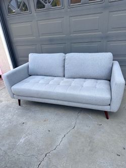 Living spaces modern grey couch