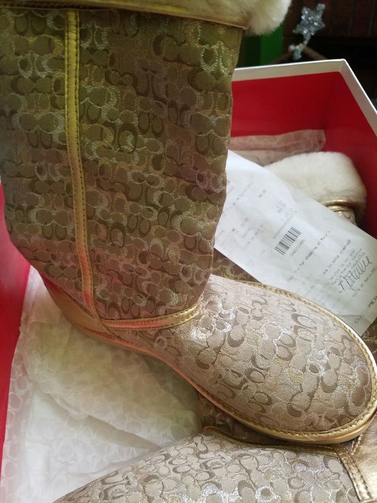 New. Coach Nikole Signature C Gold Boots size 6 NEW