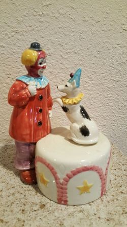 vintage clown figurine with dog .music box