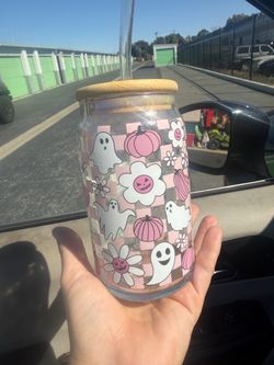 Ghost glass cup with a straw