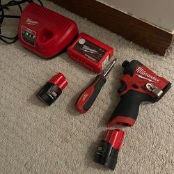 Milwaukee M12 impact driver kit (driver + charger + 2 batteries + bits