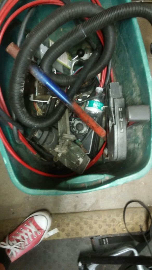 Box full of miscellaneous Marine shifters and cables