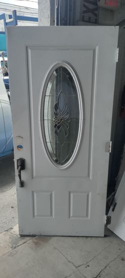 Exterior metal single door with designer glass 36x79 with very little rust at the bottom see last photo