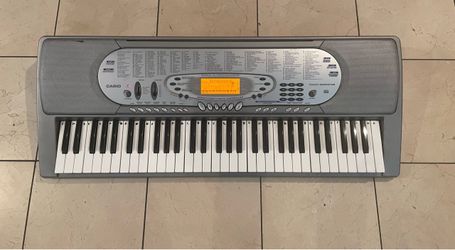 Casio CK-574  piano teacher