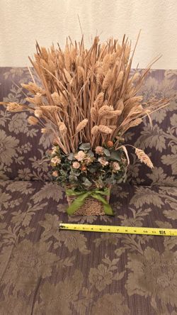 Floral Arrangement With Eucalyptus In Basket