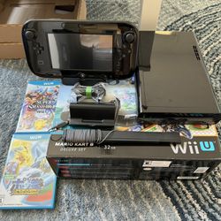 Nintendo Wii U (with 2 games and free TV!!)