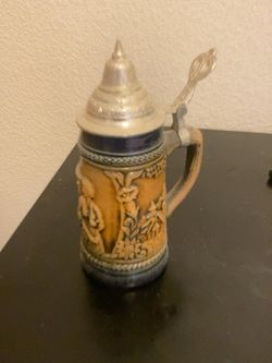 Set of 5 Collectible German Beer Steins and candle