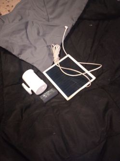 Ring camera with solar panel