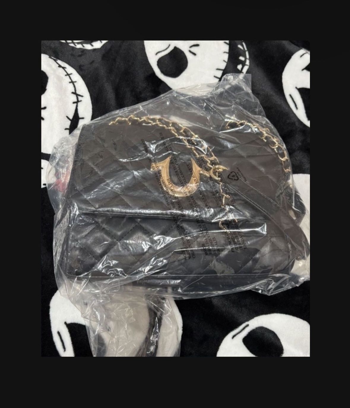 Black Quilted Shoulder Bag With Gold Chain