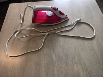 Red and White Black Decker Iron