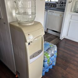 Used G.E. 5-gallon Water Cooler Dispenser- Hot And Cold- Top Load