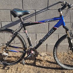 TREK 