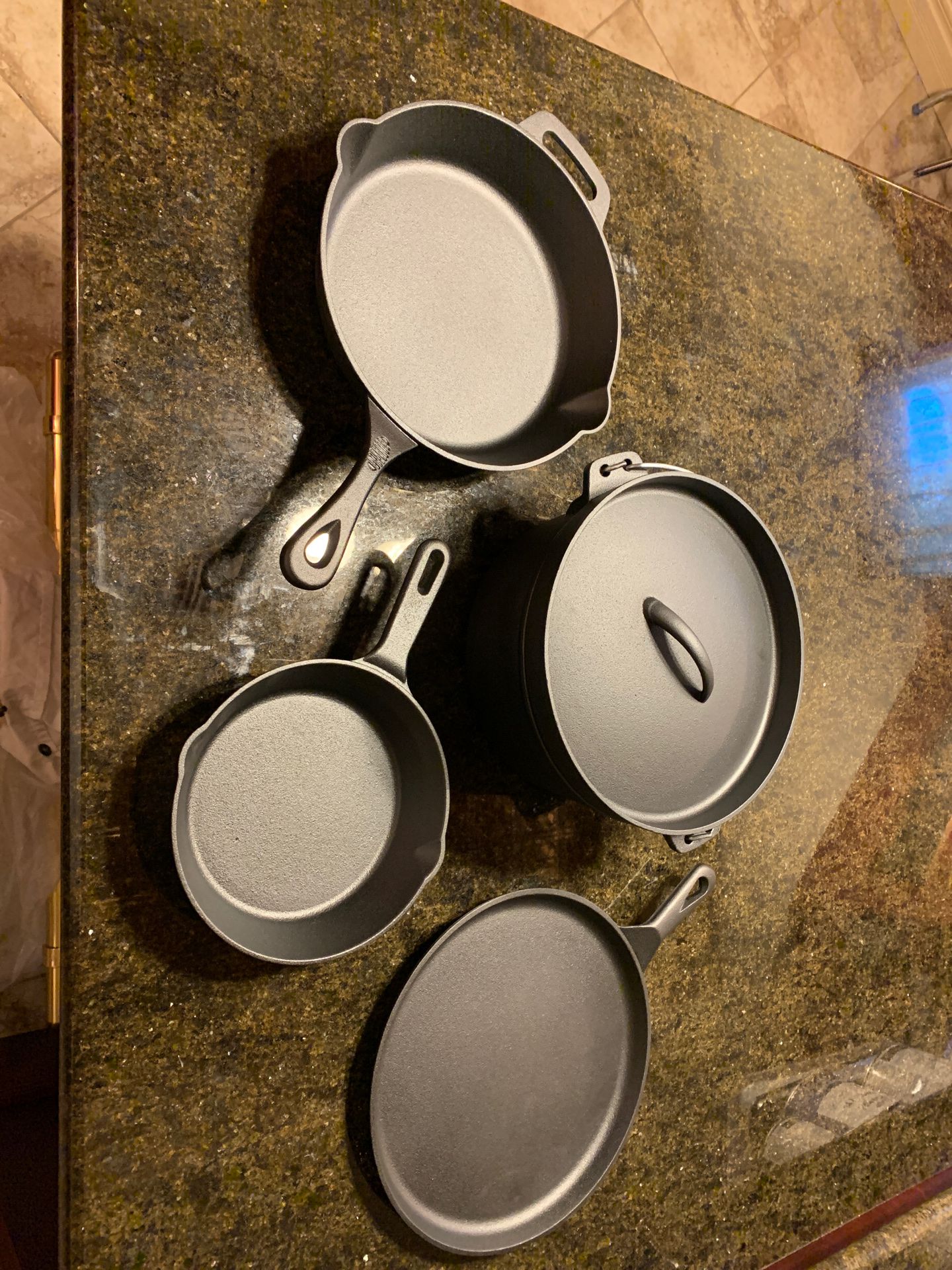 New Amazon cast iron set of pans and covered pot
