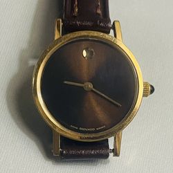 🔲.    women watch MOVADO Museum.