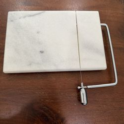 Crate & Barrel cheese board slicer