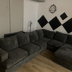 Large grey sectional couch