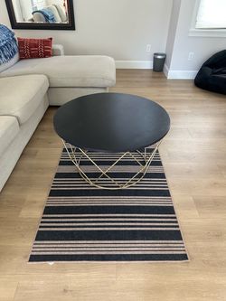 Round Black Coffee Table with Gold Wire Base