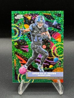 2025 Topps Chrome Cosmic Green #33 Amon-Ra St Brown #/75