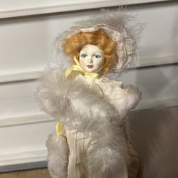 Royal Doulton Nisbet Porcelain Doll with Swans-Down (feathers)