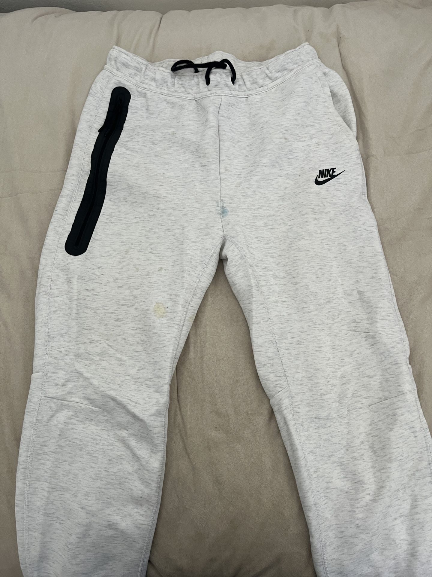 Nike Tech Fleece joggers in a grey color