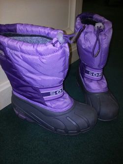 Women's Sorel purple snow boots. Size 4