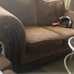 Free Couch With A Brown Storage Dresser