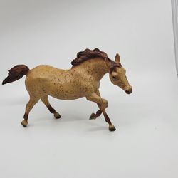 Breyer Running Stallion 128 #19 Traditional 1 Semigloss Vintage 
Red Roan.
It is a vintage collectible horse figure made of plastic in the Uni