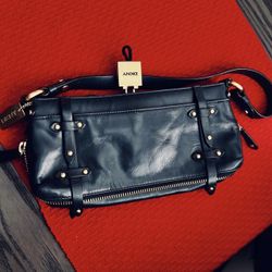 Vintage DKNY Donna Karan Small Black Leather Clutch Bag with Gold Detailing