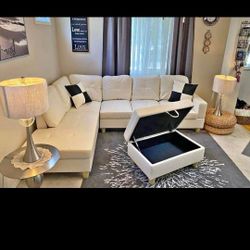 New White Leather Sectional And Ottoman 