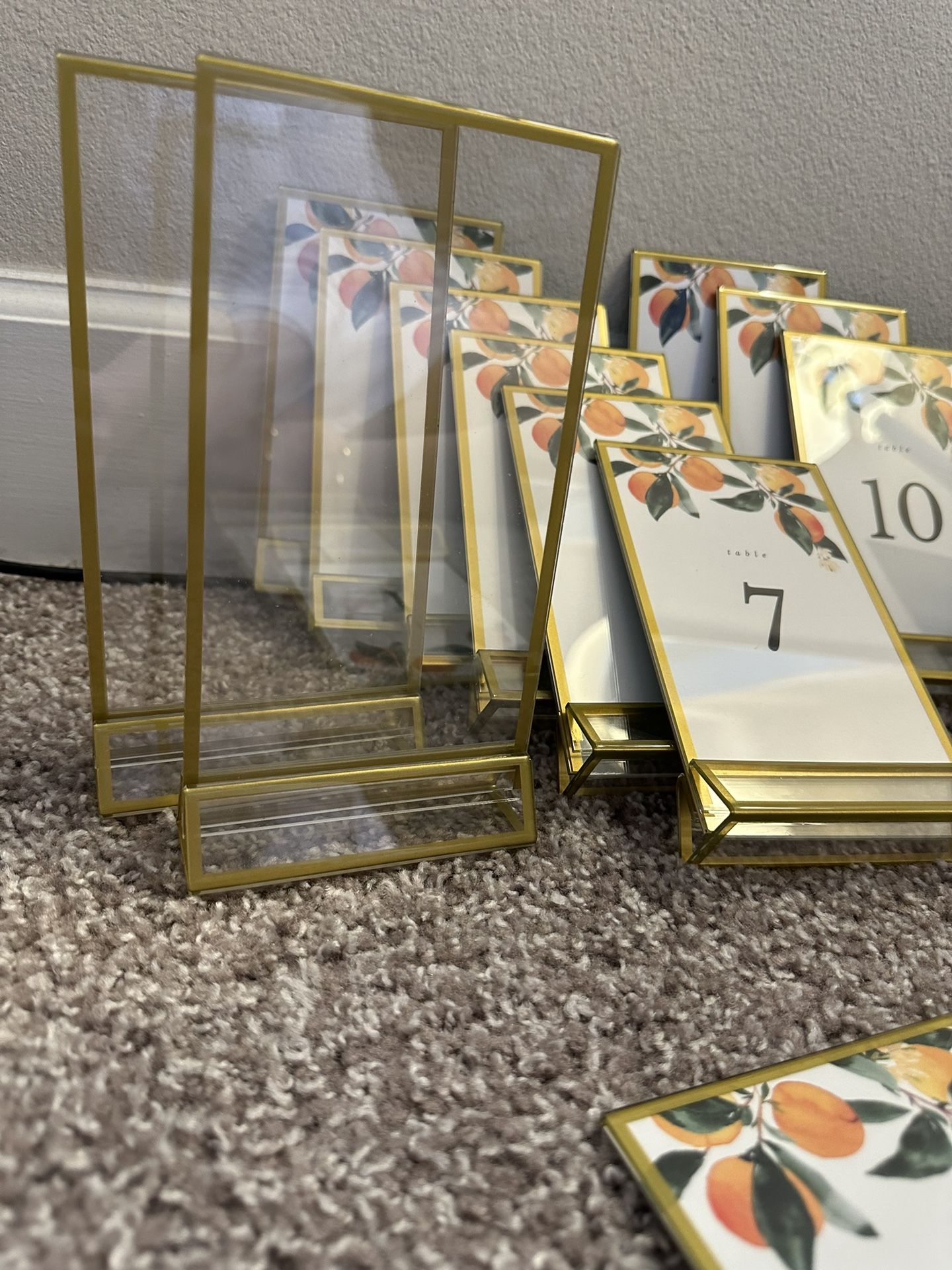 15 Wedding table numbers - 12 gold & clear plastic stands - 3 gold metal stands 