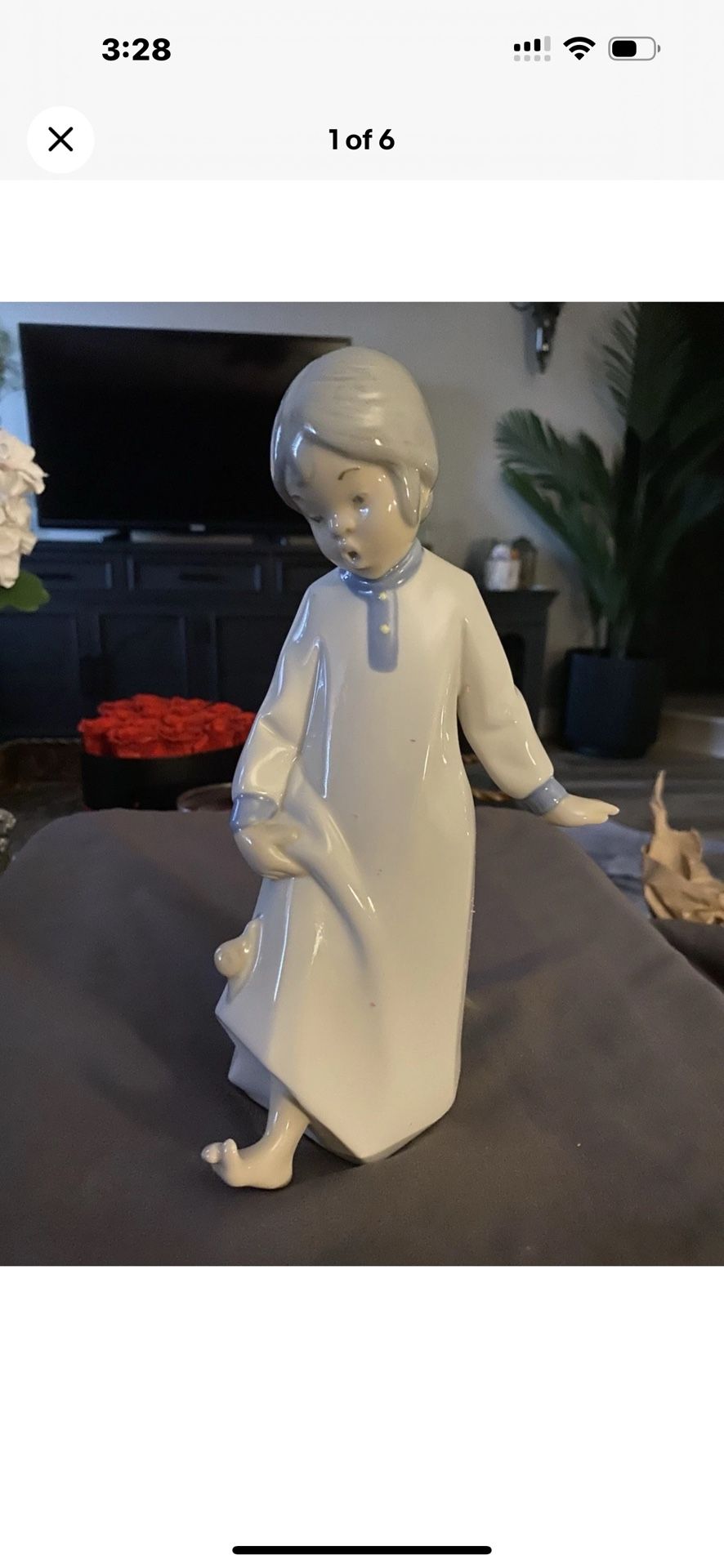 Discover the charm of Spanish craftsmanship with the rare vintage REX VALENCIA porcelain figurine. This medium-sized collectible showcases a delightfu