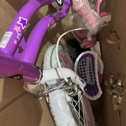 purple and white  bicycle for kids 16” bike