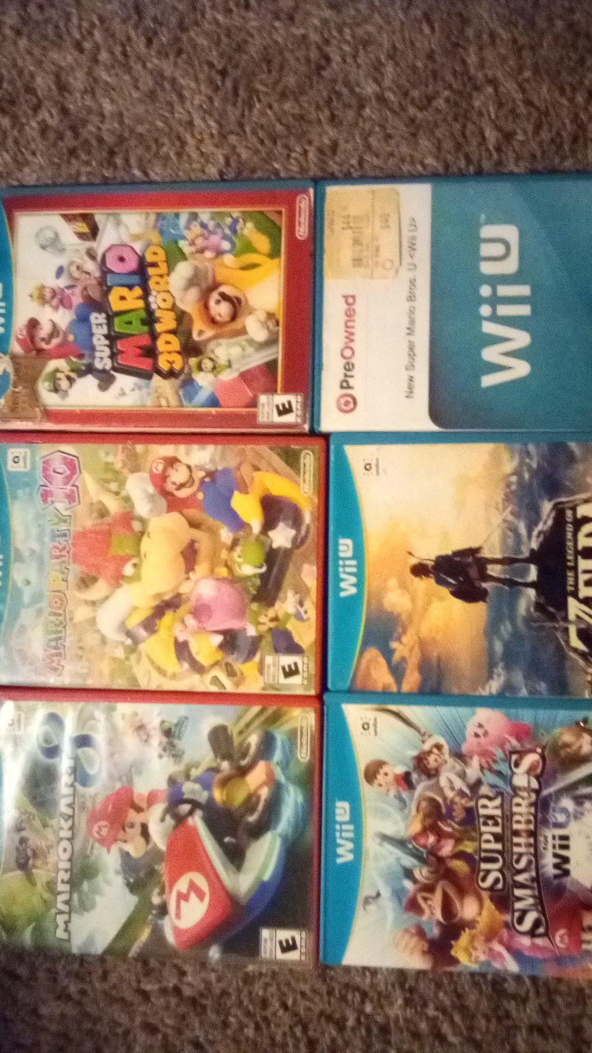 Wii U games. Super smash Bros, Zelda Breathe of Wild, Super Mario Bros Wii U, Super Mario Bros 3D World, Mario Kart 8, Mario Party 10